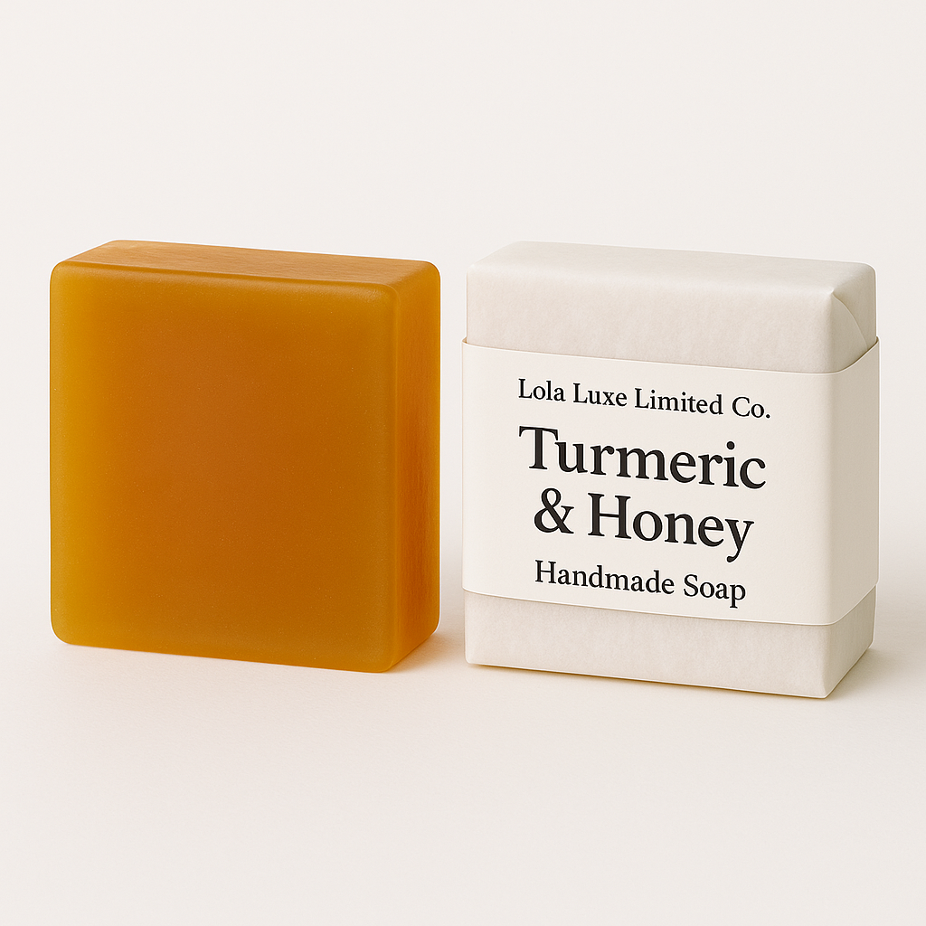 Orange bar of soap next to its white box labeled 'Turmeric & Honey' by Lola Luxe Limited Co. on a white background.