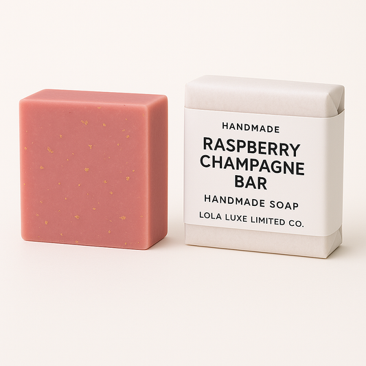 Pink handmade soap bar next to its packaging on a white background